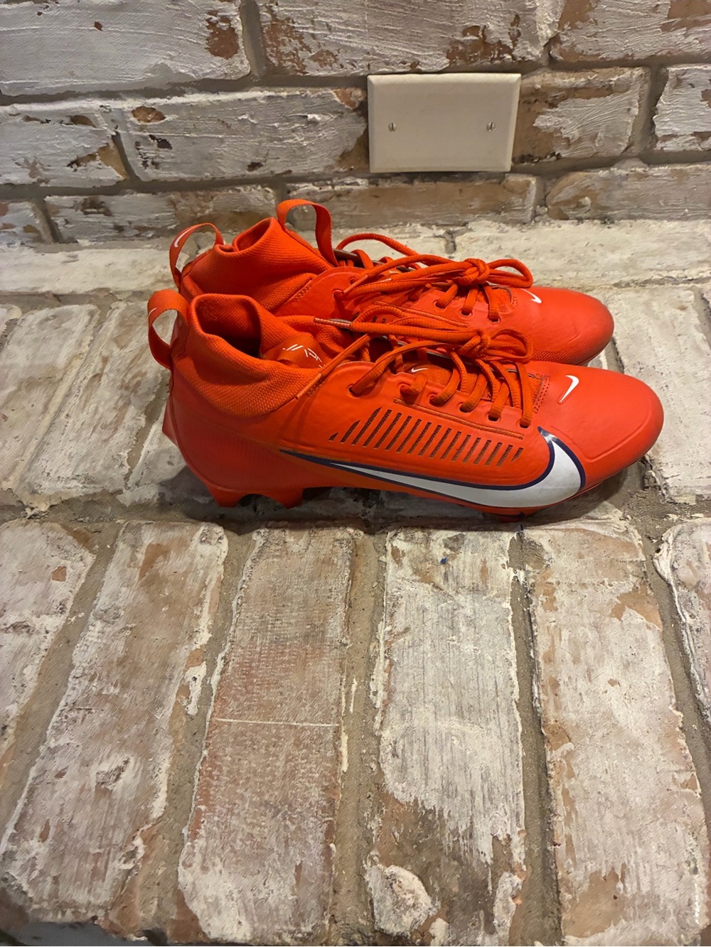 Nike Youth Bright Orange Soccer Cleats with White Swoosh